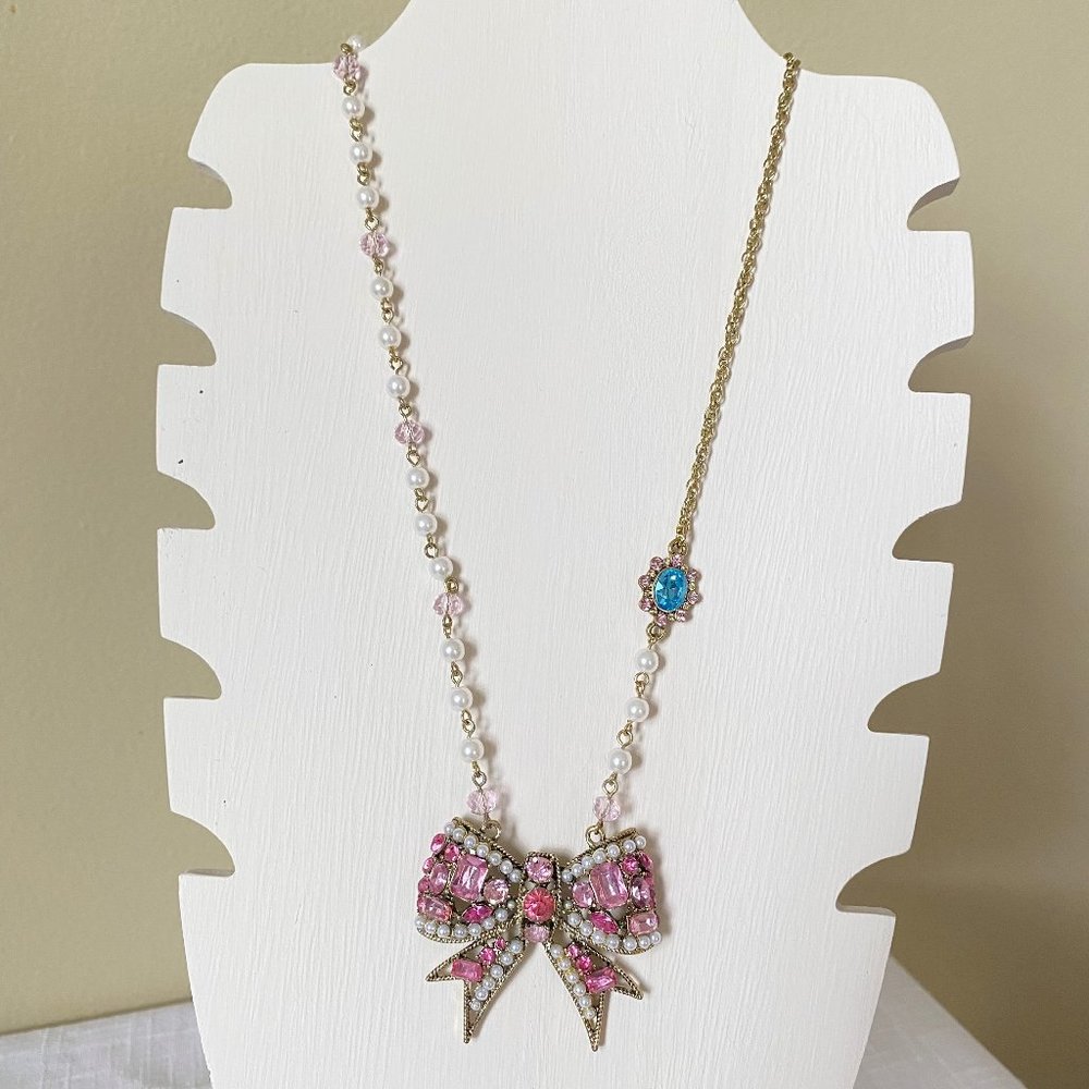 Betsey Johnson Antique Gold Tone Crystal Bow Pendant Necklace - Picture 2 of 4